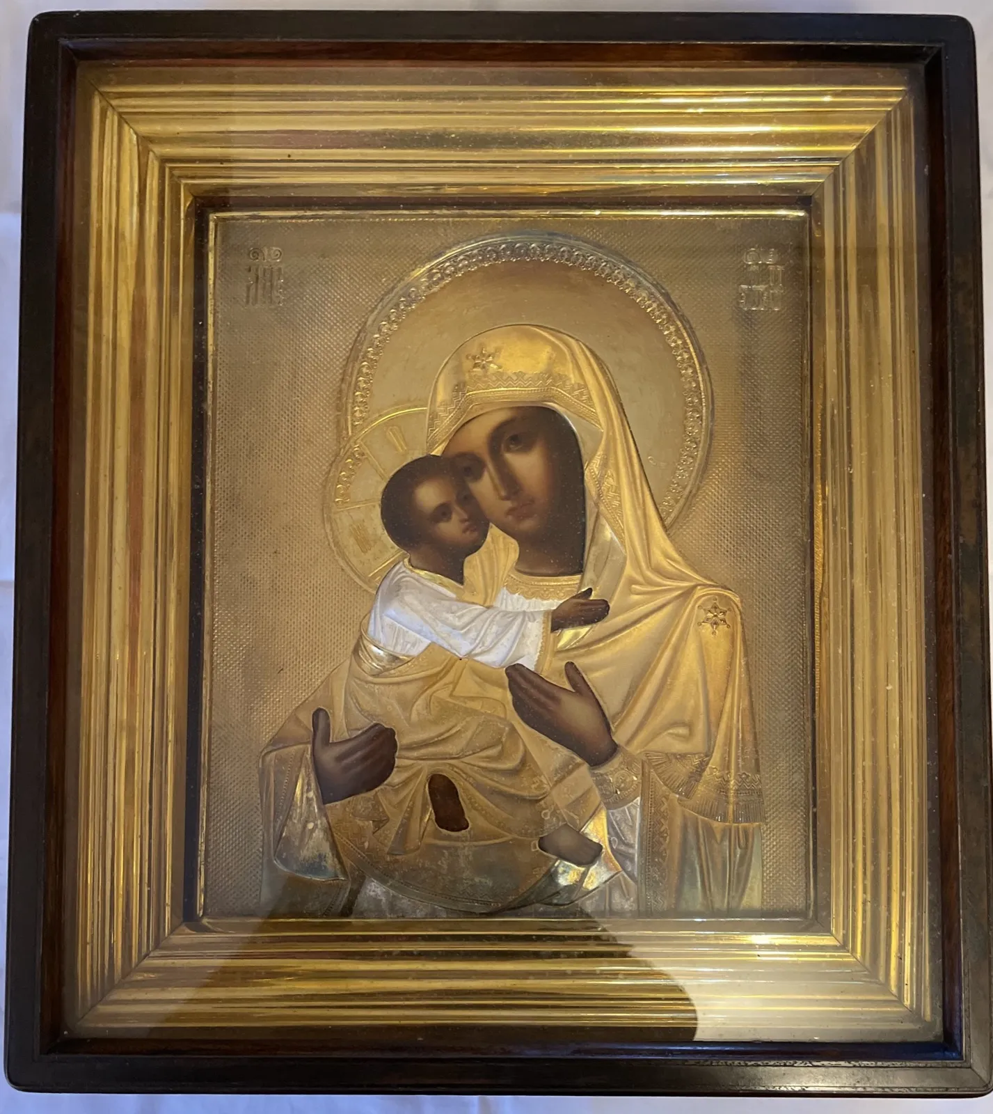 The Frost family icon, now at St Peter's, Formby — Mother of God in a gilded riza, marked МР ΘΥ in the upper corners.
